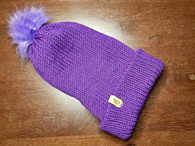 Adult beanies with a brim and pom pom
