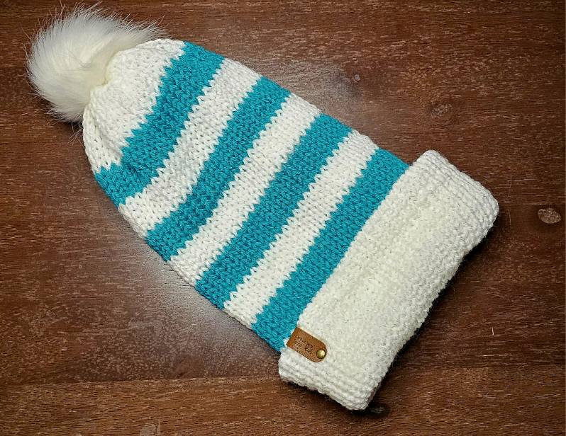 Adult beanies with a brim and pom pom