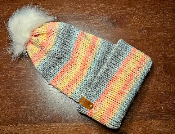 Adult beanies with a brim and pom pom
